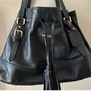Prada satchel handbag. Black leather. Comes with authenticity cards.